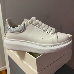 Alexander McQueen White and Silver Sneakers with Bold Silhouette